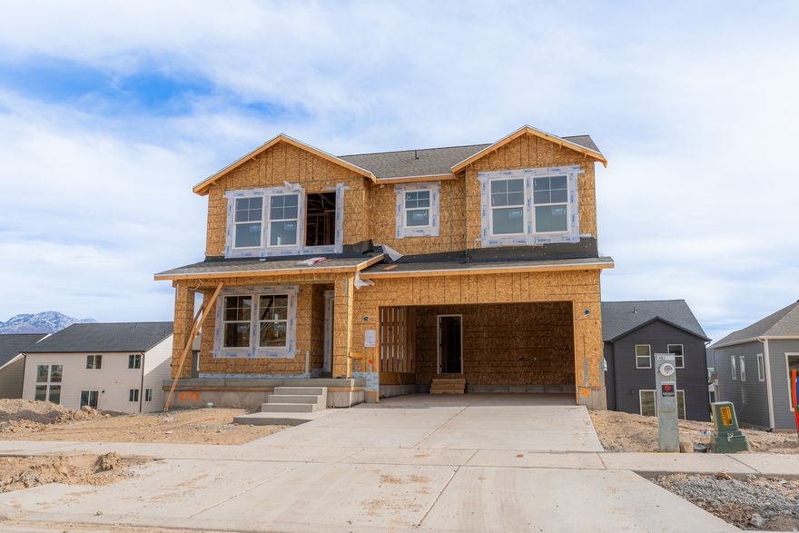 Welcome to your brand-new single-family home, where style and comfort come together seamlessly. With an open-concept design and spacious rooms, this home is thoughtfully crafted for modern living. Wildflower is a vibrant master-planned community in Saratoga Springs, offering everything you need to enhance your lifestyle. Enjoy incredible amenities including a clubhouse, pool, pickleball courts, playgrounds, gathering areas, and a connected trail system. With convenient access to shopping, dining, parks, and plenty of open space, you'll have it all right at your fingertips. Reach out today to learn more or schedule your visit! (NATHAN LOT 2198)