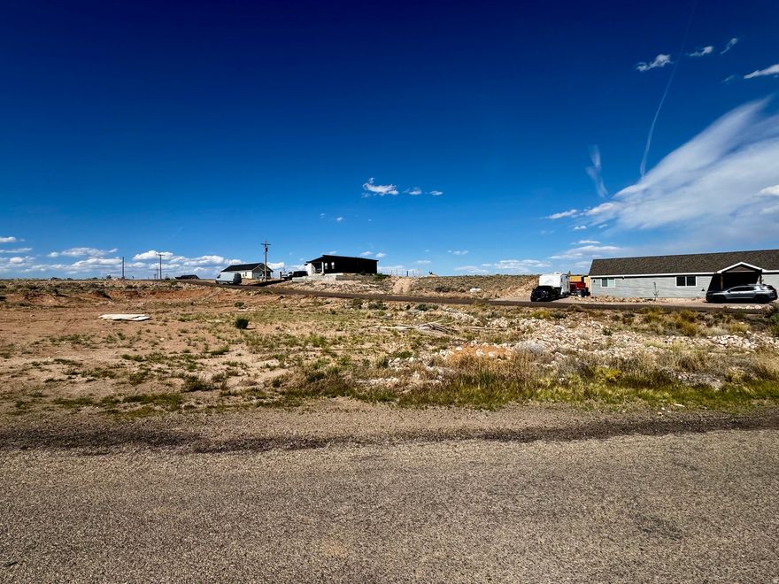 Large corner lot on Workman Dr and Moon Ave.  This lot is ready to build.  Utilities are stubbed to the lot boundary.  Inside Duchesne City limits.  Acreage figures are provided as a courtesy estimate only. Buyer is advised to obtain an independent measurement.