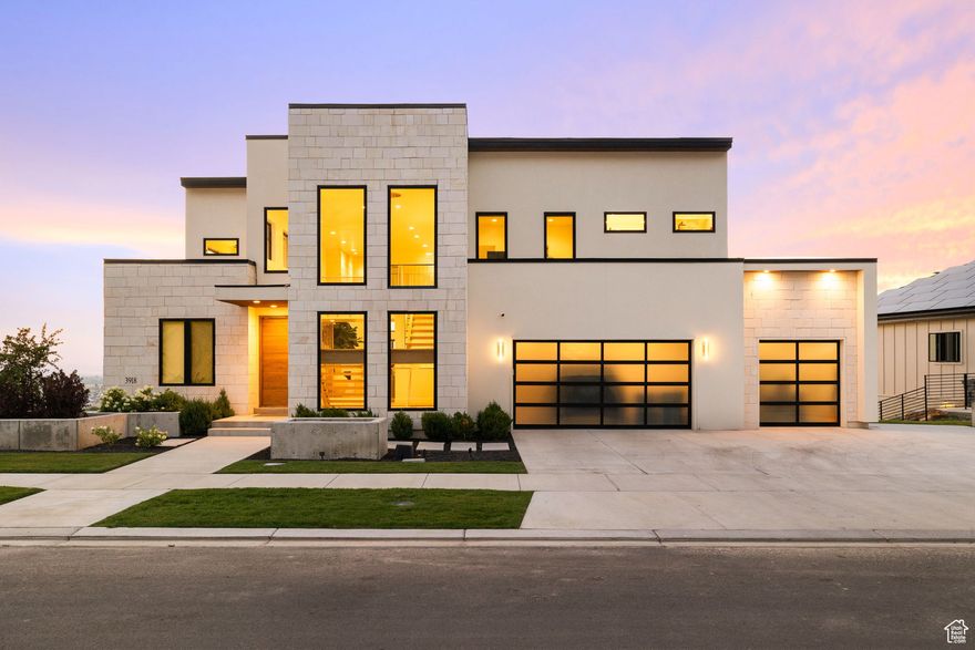 This estate was crowned as one of the most breathtaking homes in the 2023 Parade because of its elegantly bold architecture and stunning interior. The 19-foot tall ceilings in the foyer and living room complimented with the massive Anderson windows provide an unobstructed view of the valley as far as the eye can see. No expense was spared with high-end finishes like the floating stairs and glass railing, Viking appliances (even the pebble ice machine!), Taj Mahal quartz countertops, custom white oak cabinets, and a solid wood pivot front door. The primary bedroom offers a spacious bath and a walk-in closet that's simply unforgettable due to its size and functionality. The furniture that flawlessly compliments every room of the home can be yours via bill of sale. The million dollar view from the backyard is incredible along with the large grass area, sauna, and steel pergola encasing the outside grill and fire pit. This home is a masterpiece and you deserve it! Call/Text Mike Gooch anytime for a private tour of your future estate.