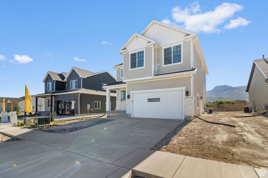 Come check out this beautiful NEW home out by the new temple in Smithfield! Close to the pool and clubhouse and pickleball courts. Amazing mountain views! You'll love the spacious feeling when you walk in the front door with the big open to below area. Beautiful kitchen with quartz countertops and cabinets stretching to the 9ft ceiling. Awesome primary suite with a big walk in closet and double sinks and a big walk in shower in the master bathroom. Home also includes a smart home package featuring a Ring doorbell, keypad on the front door, Ecobee thermostat, and MyQ smart garage door opener. Full landscaping included. You will LOVE this home and this AMAZING community. Square footage figures are provided as a courtesy estimate only and were obtained from sales brochure. Buyer is advised to obtain an independent measurement.
