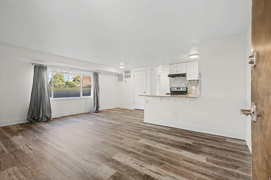 This first floor wellkept unit features updated flooring, an improved kitchen with modern touches, and convenient inunit laundry. The open living area offers great natural light, and the bedroom provides comfortable space and a functional layout. A prime location near shopping, dining, and freeway access make this an excellent lowmaintenance home.