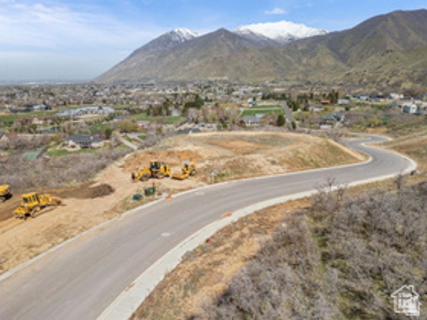 Mountainside lot located in Maple Bench Estates with breathtaking views of the surrounding mountains and valleys! A fantastic opportunity to build your dream custom home in a stunning natural setting. Major dirt work and renovations done on the lot recently. Utilities stubbed to the lot. LINK FOR MORE INFO http://maplebench.com. SEE LISTING DOCUMENTS ATTACHED AS WELL. Acreage as per County. Buyer and Buyer's Broker to verify all information.
