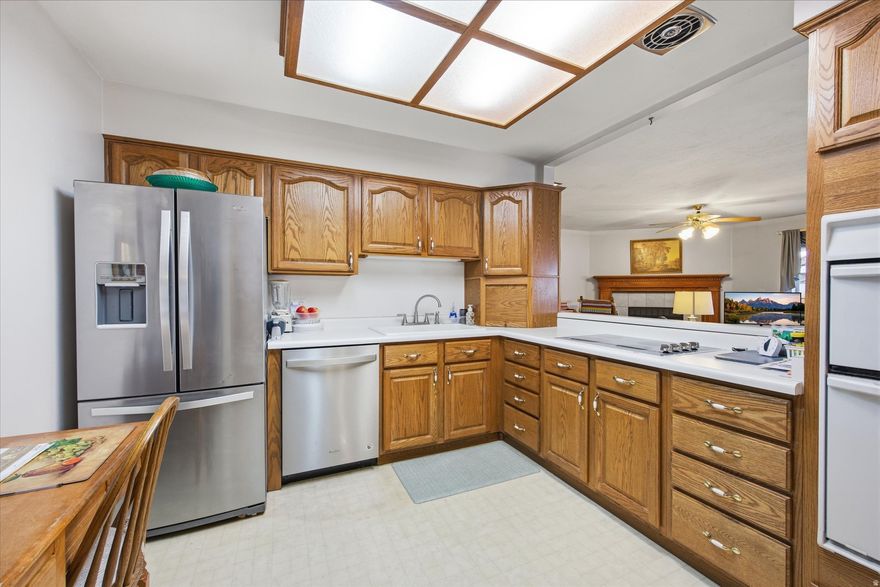 **HUGE PRICE DROP- MOTIVATED SELLER!! Single Level Living at its finest in this Spacious 55+ Condo in the heart of Bountiful! With Tons of Natural Light, an Open Floor Plan & a Comfortable Gas Fireplace, this Main Level 2 Bed, 2 Bath Condo offers Comfort & Sustainability. Further features include a Cute Outdoor Patio w/ a Brand New Vinyl Fence, a Stainless-Steel Refrigerator & Dishwasher. This Gem also features Double Ovens & a Cooktop, Crown Moldings, Water Softener & a storage room right inside the Laundry Room. This is one you will not want to miss!