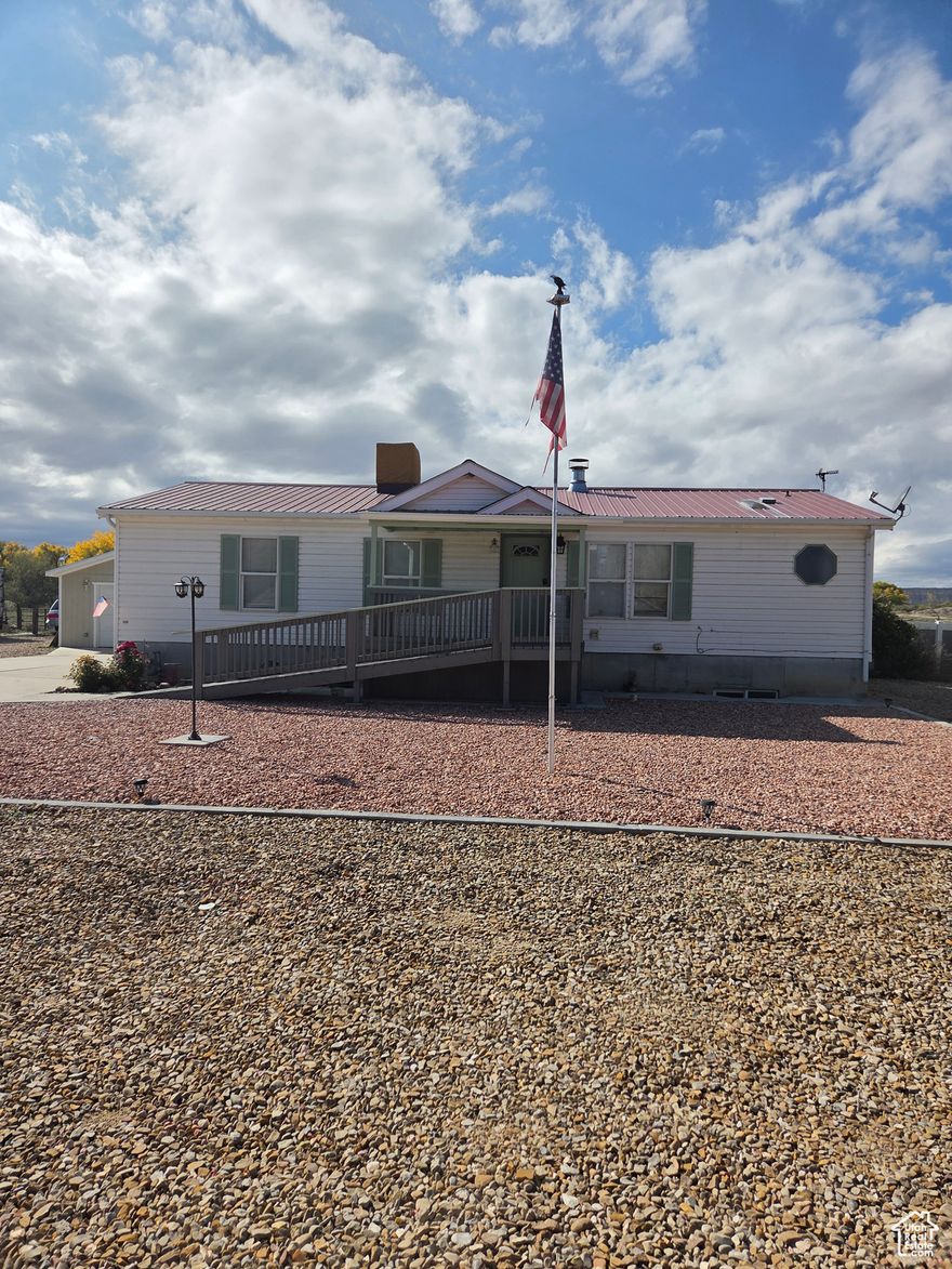 Square footage figures are provided as a courtesy estimate only and were obtained from ~COURT HOUSE RECORDS~ .  Buyer is advised to obtain an independent measurement.  HOME IS SOLD "AS-IS."  NO WARRENTIES IMPLIED OR SUGGESTED.  Looking for a permanent place to call home? Don't overlook this spacious 3-bedroom, 2-bath gem! With a full basement offering room to expand - including space for 2 additional bedrooms and plumbing already in for a third bath - this home is full of potential.   Enjoy animal rights, a detached garage, and 1 acre of peaceful living with zeroscape landscaping for easy maintenance. Cozy up by the fireplace on cool evenings and soak in the tranquility of this quiet neighborhood.  A perfect blend of comfort, space, and opportunity; make it yours today!  HOME IS SOLD "AS-IS". NO WARRENTIES SUGGESTED OR IMPLIED.