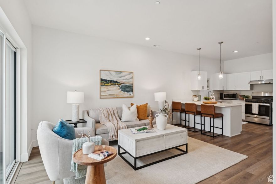 Welcome to Capri Village, a hidden gem nestled in the heart of Millcreek. This charming subdivision offers a unique blend of suburban tranquility and urban convenience, making it a perfect place to call home.This highly sought-after 55+ community offers comfortable, low-maintenance living. Along with a pool and clubhouse to enjoy, the community is well-maintained and includes snow removal. Completed in 2021, this is a modern, single-level condo that features a bright, open floor plan. The kitchen has beautiful white quartz countertops with plenty of surface area for cooking. The counter height and a counter top microwave oven were installed with wheelchair accessibility in mind. Head outside through the sliding glass doors and you will discover a quiet, fenced patio to relax and enjoy the fresh air. The bedrooms are both roomy and flexible. Two bathrooms, one with a bath and the other with a walk-in shower, allow privacy for everyone. A dedicated and covered parking space is only a few steps from the front-door; this makes bringing in the groceries a breeze. Don't wait, come see how fabulous a mature neighborhood with contemporary living can be!  Square footage figures are provided as a courtesy estimate only and were obtained from plat map and tax records.  Buyer is advised to obtain an independent measurement.