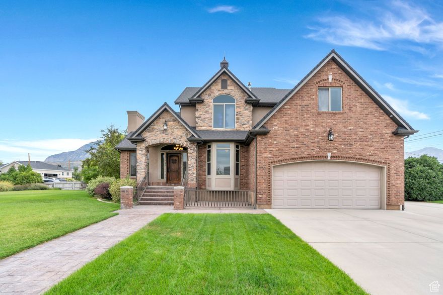 This beautifully crafted 2-story custom home by Chatwin Homes is located just minutes from BYU, Provo Canyon, and Orem High School. Designed with attention to detail, it features exquisite custom woodwork throughout, including hardwood floors on the main level, built-in bookshelves in the office, and elegant custom cabinetry in the kitchen. Upstairs, the spacious master suite has a truly exceptional walk-in closet. The garage is extra deep and includes a tandem bay along with a dedicated workshop area, perfect for projects or additional storage. Other notable upgrades include a new water softener, a whole-house humidifier, a brand-new water heater, surround sound, RV Parking, and stunning views of Mt. Timpanogos. An unfinished basement provides ample storage or the potential for more great living space.