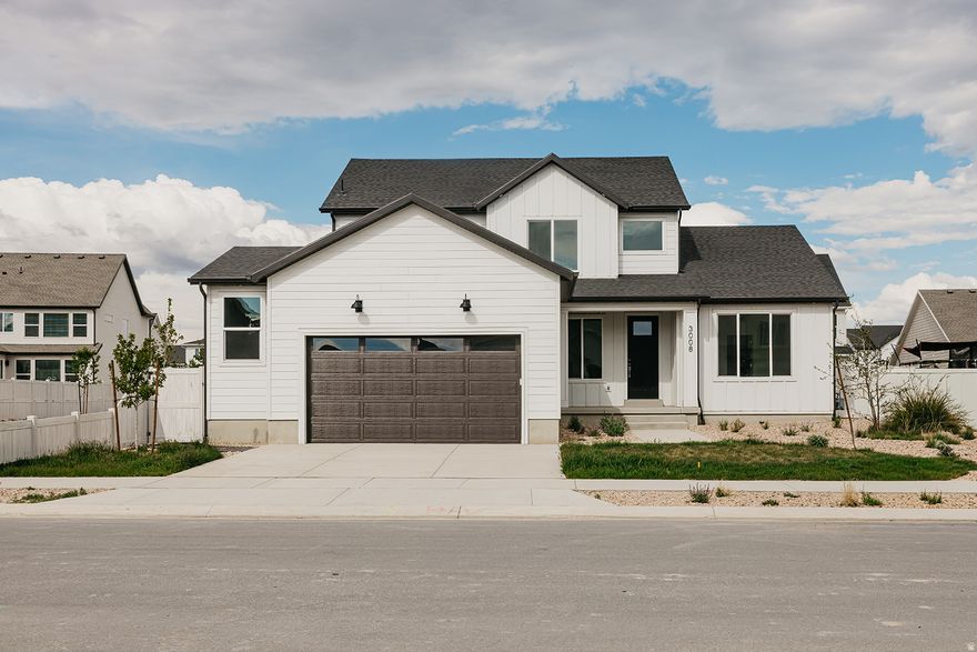 The Durango is a stunning two-story floor plan featuring four bedrooms and two-and-a-half bathrooms. The main floor includes a formal living room or office off the entryway, a primary suite with a massive walk-in closet, and convenient spaces like a mudroom, powder bath, and pantry near the garage. The great room impresses with two-story ceilings and abundant natural light. Upstairs, three bedrooms share a full bathroom, with a nearby laundry room for added convenience, making the Durango an ideal layout for families. This home is located in Firefly, the master-planned community built specifically for kids to live life unplugged. Stop fighting over screen time and start reconnecting in an environment engineered to encourage play. Firefly isn't just a neighborhood, it's a 350+ acre network of parks, trails, and amenities designed to inspire adventure and activity. The day you move in, your kids will be enjoying the skate and wheels park, the bike pump track, the downhill mountain bike course, pickleball and basketball courts, neighborhood playgrounds, and miles of trails. Is your child shy? Firefly has the region's only full-time Activities Director curating weekly activities and events for all ages, encouraging families and neighbors to connect in nature. Located in Eagle Mountain, Firefly is an easy commute to the Silicon Slopes, with close proximity to shopping and entertainment. Just 40 miles south of Salt Lake City and 30 miles north of Provo, it's one of Utah County's fastest-growing cities. Book a tour of this beautiful Candlelight home, explore all the amenities, and see for yourself why Firefly is the best place in Utah to raise your kids.