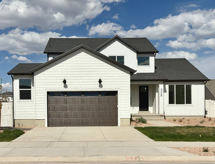 The Durango is a stunning two-story floor plan featuring four bedrooms and two-and-a-half bathrooms. The main floor includes a formal living room or office off the entryway, a primary suite with a massive walk-in closet, and convenient spaces like a mudroom, powder bath, and pantry near the garage. The great room impresses with two-story ceilings and abundant natural light. Upstairs, three bedrooms share a full bathroom, with a nearby laundry room for added convenience, making the Durango an ideal layout for families. This home is located in Firefly, the master-planned community built specifically for kids to live life unplugged. Stop fighting over screen time and start reconnecting in an environment engineered to encourage play. Firefly isn't just a neighborhood, it's a 350+ acre network of parks, trails, and amenities designed to inspire adventure and activity. The day you move in, your kids will be enjoying the skate and wheels park, the bike pump track, the downhill mountain bike course, pickleball and basketball courts, neighborhood playgrounds, and miles of trails. Is your child shy? Firefly has the region's only full-time Activities Director curating weekly activities and events for all ages, encouraging families and neighbors to connect in nature. Located in Eagle Mountain, Firefly is an easy commute to the Silicon Slopes, with close proximity to shopping and entertainment. Just 40 miles south of Salt Lake City and 30 miles north of Provo, it's one of Utah County's fastest-growing cities. Book a tour of this beautiful Candlelight home, explore all the amenities, and see for yourself why Firefly is the best place in Utah to raise your kids.