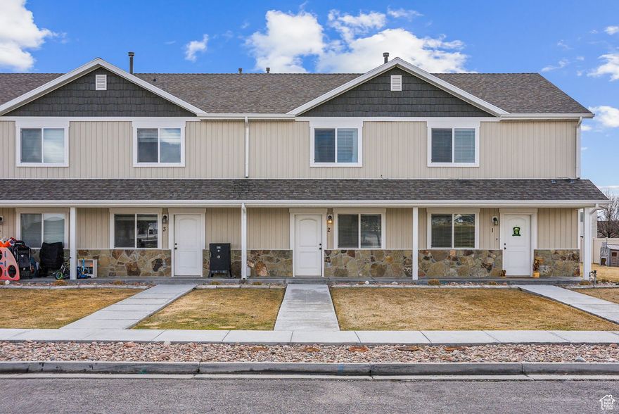 Desirable location in Tremonton.  Close to the freeway, yet tucked away off a busy street.   This building is on a corner lot and offers beautiful  mountain views from the front porch and front bedroom.  Fiber internet has been added to the  townhome for faster internet connection.  The seller has kept the townhome in turn-key condition.  Seller has added a textured focal wall in the living room, which acts as a sound barrier for added peace and enjoyment.  Water heater is less than 2 years old. *HOA dues have not increased since the home was purchased in 2019.   USDA rural housing  is available to buyers who qualify. Don't miss the opportunity to own the modern home at an affordable price.