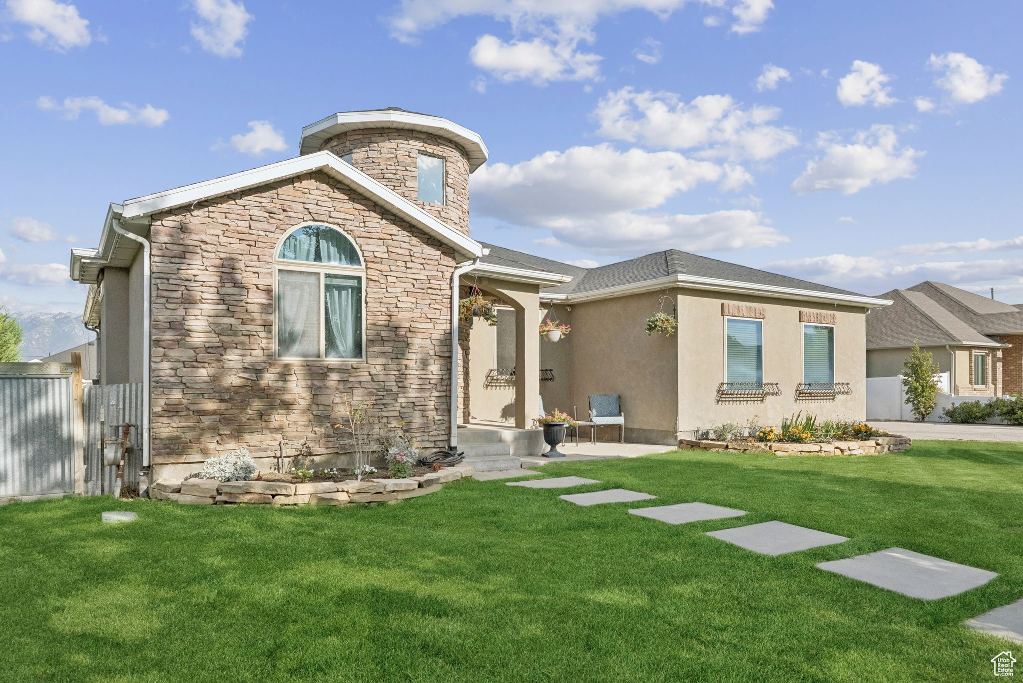 Open House Sat, Oct 4. 10am-Noon. Welcome to a one-of-a-kind property ideally located within walking distance to The District, just minutes from Mountain View Village and Daybreak, and easy access to Bangerter Highway. The inviting entryway leads to a spacious, open kitchen with room for a large dining table and a possible island at the center of it all - perfect for gatherings. Enjoy the quiet and comfort inside and the west-facing primary bedroom offering a private escape at the end of your day. Park up to 15 vehicles on property if needed, including RV parking behind the gate. Attached two-car garage and the second, six-car garage is a dream workshop with radiant floor heating, seven 220 outlets, and a vaulted, textured ceiling. Your backyard retreat includes terraced landscaping with space for play areas, a future garden, a pool, or pickleball court. The large afternoon-shaded patio and firepit create a relaxed setting with mature trees that provide a sense of seclusion. With an easily added basement entrance, this home is primed for a future mother-in-law suite or ADU income potential! CLICK TOUR to watch the short tour video. Buyer and buyer's agent to verify all.