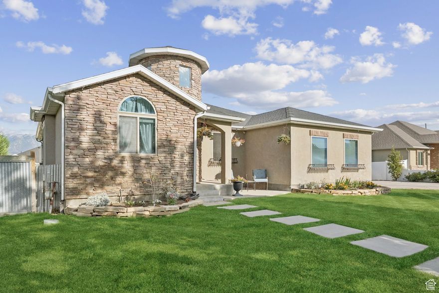Open House Sat, Oct 4. 10am-Noon. Welcome to a one-of-a-kind property ideally located within walking distance to The District, just minutes from Mountain View Village and Daybreak, and easy access to Bangerter Highway. The inviting entryway leads to a spacious, open kitchen with room for a large dining table and a possible island at the center of it all - perfect for gatherings. Enjoy the quiet and comfort inside and the west-facing primary bedroom offering a private escape at the end of your day. Park up to 15 vehicles on property if needed, including RV parking behind the gate. Attached two-car garage and the second, six-car garage is a dream workshop with radiant floor heating, seven 220 outlets, and a vaulted, textured ceiling. Your backyard retreat includes terraced landscaping with space for play areas, a future garden, a pool, or pickleball court. The large afternoon-shaded patio and firepit create a relaxed setting with mature trees that provide a sense of seclusion. With an easily added basement entrance, this home is primed for a future mother-in-law suite or ADU  income potential! CLICK TOUR to watch the short tour video. Buyer and buyer's agent to verify all.