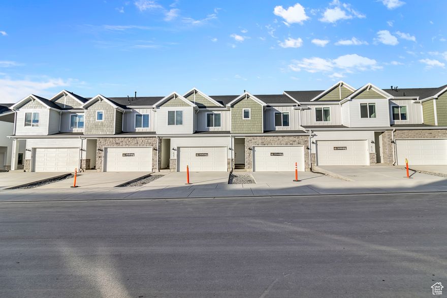 Currently under construction end unit and interior units available- est completion Dec 15.  New townhome layout with a fully finished basement in Smithfield's highly sought after community, Village at Fox Meadows. Featuring 9' ceilings on the main level, large Primary bedroom with en suite and large Walk in Closet, loft space that allows for multiple uses, and excellent storage throughout the home!   The home also boasts finer finishes such as a tile backsplash, quality LVP and carpet, elevated plumbing fixtures, and a gas range. This home gives luxury vibes!  Village at Fox Meadows is also Cache Valley's new up and coming community with pool, pickleball courts, open spaces and walking trails. Surrounded by mountains and other Cache Valley landmarks, there are stunning views in every direction!