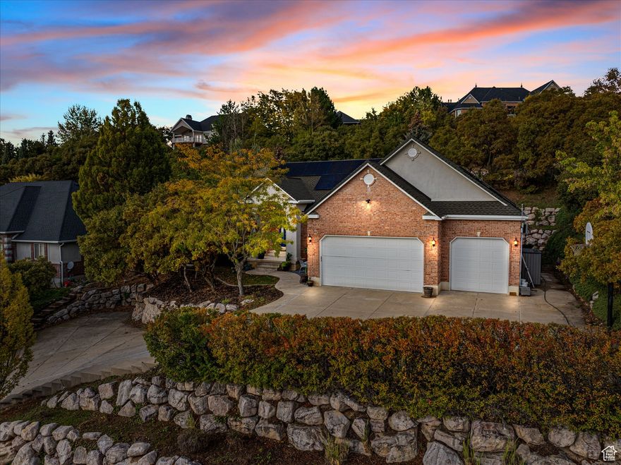 Welcome to your private retreat at the end of a quiet cul-de-sac. This beautifully updated 6-bed, 5-bath home sits on a half-acre lot with mountain views and room to relax, entertain, and truly enjoy life.  Step inside and you'll instantly feel how thoughtfully this home has been cared for. The open kitchen and great room were fully remodeled in 2025, blending modern design with warm, inviting finishes-new flooring throughout, quartz countertops, a gas cooktop, and a cozy tiled fireplace that brings everyone together.  The primary suite feels like your own spa getaway, complete with a steam shower, freestanding soaking tub, heated floors, and sleek floor-to-ceiling glass. Every upgrade was made for comfort and peace of mind: a heated driveway (2025), solar panels with two backup batteries (2023), new roof (2021), new water heater (2025), and a separate HVAC system for the home theater (2025). The details make all the difference-epoxy floors in the basement, whole-house humidifiers, Nest thermostat, programmable lighting, and keyless entry. Outside, the backyard is ready for every season with a private pool, new pool cover, and surround-sound speakers inside and out. Whether you're hosting friends for a summer barbecue or watching movies on your 130" projector screen, this home was built for connection and comfort. With Utopia Fiber internet, ethernet throughout, and every major system already updated, all that's left to do is move in and start making memories.