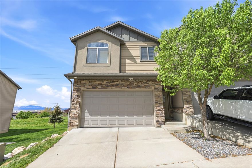 Welcome home! This beautifully designed 3-bedroom, 2-bathroom townhouse in North Layton offers the perfect blend of style, comfort, and convenience. With approximately 1,965 sq ft, this home features a highly desirable layout, including one of the few unfinished basements in the community, giving you the opportunity to customize additional living space, a home office, gym, or extra storage to fit your needs.  Step inside to an open-concept main floor filled with natural light, where the kitchen, dining, and living areas flow effortlessly together, perfect for entertaining or everyday living. The clean, modern design creates a warm and inviting atmosphere throughout.  Upstairs, you'll find three generously sized bedrooms, including a spacious primary suite complete with a private bathroom and large walk-in closet, your own personal retreat.  Ideally located just minutes from I-15, Hill AFB, Weber State University, and a variety of shopping, dining, and everyday amenities, this home is perfect for first-time buyers or anyone looking for low-maintenance living in a prime location.  Don't miss your chance to own in Parkway Village, where comfort, convenience, and potential come together.  Square footage figures are provided as a courtesy estimate only and were obtained from county records. Buyer is advised to obtain an independent measurement.