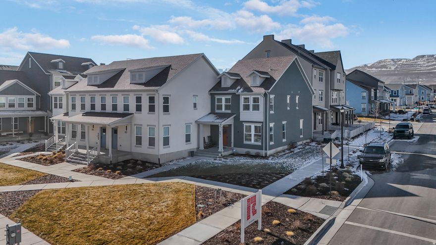 Welcome to this charming end-unit townhome, located in the beautiful Cascade Village of Daybreak. This one has a yard that can be fenced! Nice upgrades have been added to this home, including plantation shutters, water softener, RO system and garage shelving. Incredible views of the mountains. Easy access to Mountain View Corridor and Bacchus Hwy for a smooth commute, and plenty of dining, entertainment and shopping nearby. With just a short walk or a quick bike ride to the new Watercourse and Cove House, you'll find yourself wandering through the trails, on the beaches and docks, experiencing the good life. You'll love it here!