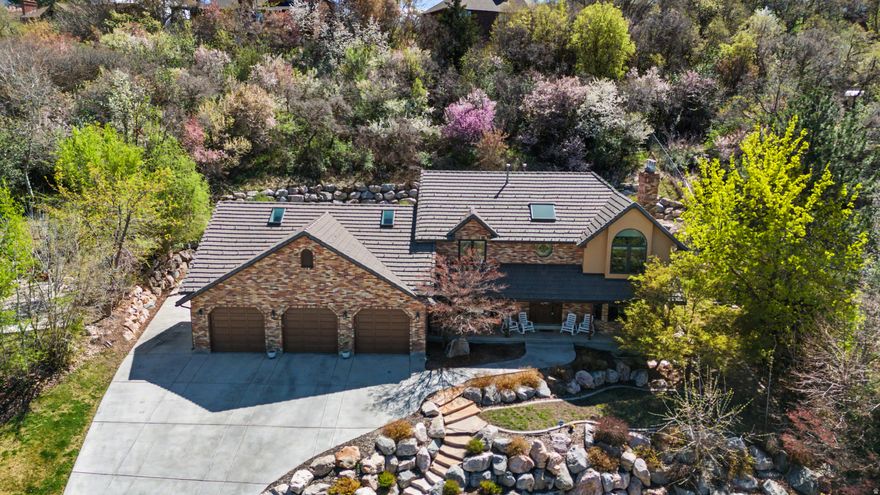 IT'S TIME TO MOVE! The vegetable garden is tilled and ready for YOU to plant it. This Southeast Ogden Executive Home is Completely, Professionally Remodeled in 2021. Private .52 Acre Lot, Beautifully Landscaped in cul-de-sac adjacent to gated luxury community. Majestic mountain views! Minutes from SLC, airport, skiing, hiking, boating. Immaculate and move in ready! Remodel includes NEW: recessed lighting, cabinets, granite in kitchen & baths, appliances: 29.5 CuFt refrigerator, gas cooktop/oven plus built in wall oven and microwave/convection oven. New tiled baths, showers, tub and sinks, carpet and LVP flooring, wood framed Pella windows and sliding doors with built in shutters, skylights, high efficiency HVAC systems, water softener, tankless water heater. Call today and make this YOUR DREAM HOME!