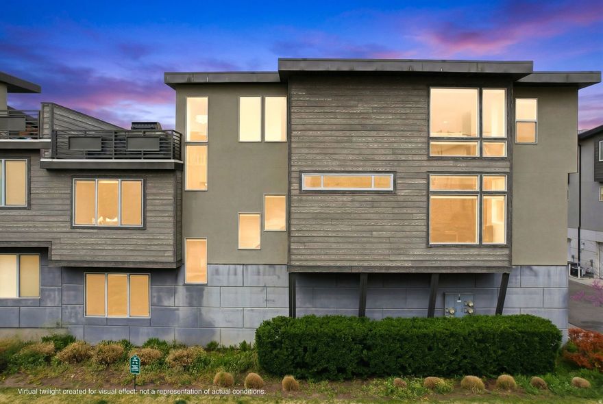 Come see this gorgeous modern rooftop townhome with a spacious 2-car garage in central Midvale! Newly Built in 2015, this bright and inviting 1,671 sq ft home features 3 bedrooms and 2 bathrooms. It offers an open-concept living space perfect for everyday living and entertaining. The spacious great room flows seamlessly into the kitchen, featuring contemporary finishes, ample cabinetry, and a functional layout. The main level includes one bedroom, while the second floor features the primary suite with its own private bathroom plus a third generous bedroom. Large windows throughout flood the home with natural light, while the thoughtful design maximizes comfort and style. Enjoy low-maintenance living with a private patio or balcony, plus access to community amenities. Located in the heart of Midvale, you're just minutes from shopping, dining, parks, and easy access to I-15 and TRAX for a quick commute to Salt Lake City or the Silicon Slopes. Whether you're a first-time buyer or looking for a low-maintenance lock-and-leave property, this well-built 2015 townhome delivers modern convenience in a prime location. Don't miss your chance to call this Navarro View Court gem home!