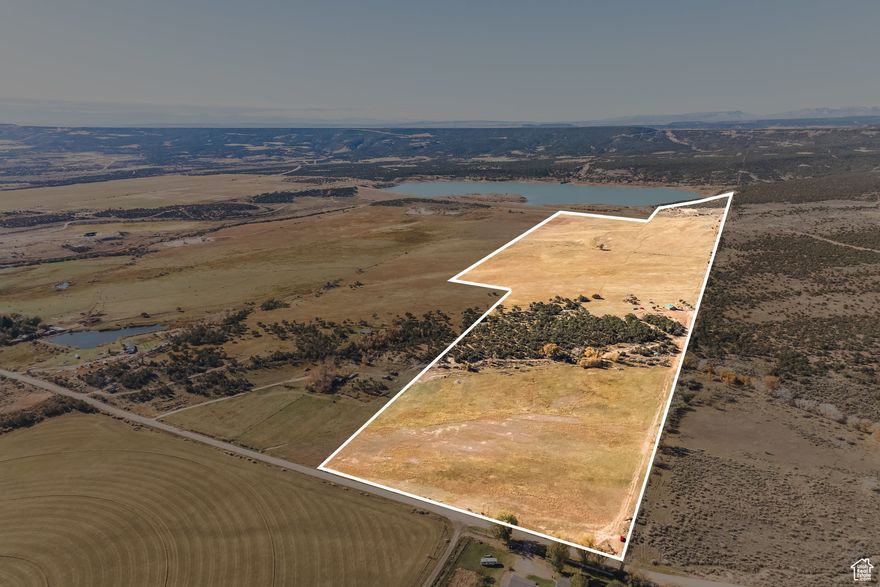 Awesome 121 acre ranch with lake and mountain views, overlooks Lake, 163 irrigation shares with main line and risers in place. Cute remodeled cabin 900 SqFt with well in place, propane heat, Quiet country lane. All information herein is deemed reliable but is not guaranteed. Buyer is responsible to verify all listing information, including square feet/acreage, to buyer's own satisfaction.