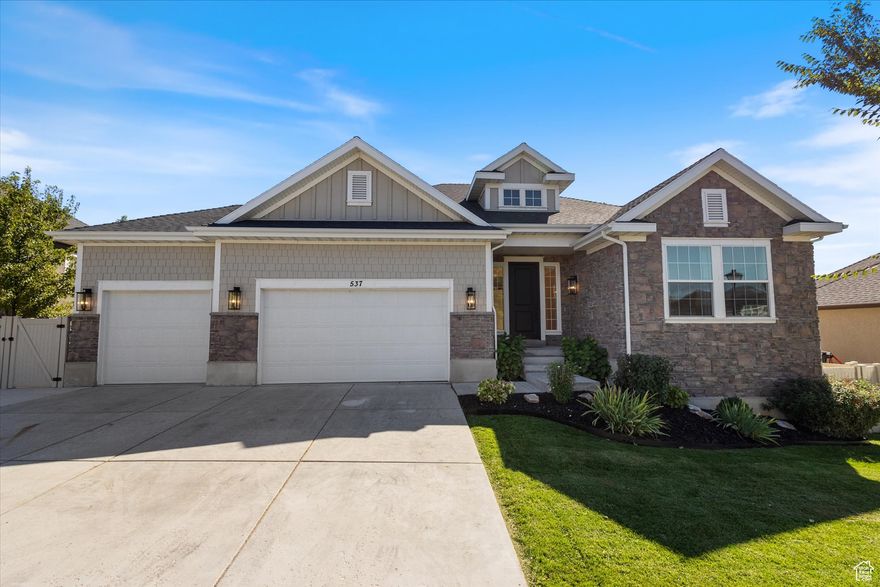 OPEN HOUSE THIS WEEKEND! Saturday Oct 4th 1-3pm. Located in the desirable Ivory Ridge community, this home combines the perfect location with fresh upgrades.  Six bedrooms, five bathrooms, a dedicated office, and large storage room provide lots of flexibility for family needs.  The main floor features 11 foot ceilings, beautiful white oak floors, 8 foot tall doors, and two bedrooms each with ensuites.  Downstairs offers roomy 9 foot ceilings, a second set of laundry connections, and lots of storage.  This home features a gorgeous new kitchen with luxury appliances including a 36" SKS gas range, nearly silent SKS dishwasher, and Scotsman pebble ice maker.  The kitchen features thoughtful details such as hideaway mixer lifter, reverse osmosis water, and a large walk-in pantry. The cabinetry has soft close doors and drawers and is topped with beautiful Taj Mahal quartz countertops.    The designer lighting and upgraded hardware provide an elegant feel throughout the home. The large primary suite feels like a vacation retreat and features moody lighting, large dual shower, free-standing soaking tub, and towel warmer.  Automated roller shades, smart lights, smart thermostat, and smart locks can all be automated to adjust the house as the day turns to night.  Two new 50 gallon water heaters ensure hot water for everyone during high demand times.    The three car garage has epoxy floors, bright lighting, and comes with the shelving and cabinets shown in the listing pictures.  The third car bay is a pull through garage with a large concrete pad behind the garage.  Additionally, the garage has a 50 amp 220V connection for an electric vehicle charger or welder.  Next to the third car garage, is a large RV pad perfect for storing extra vehicles or toys.    The yard is low maintenance with automated sprinklers and includes an in-ground trampoline, basketball hoop, fire pit, and large patio.  The Ivory Ridge Splash pad is just a short walk away.  Close to the freeway and the newly announced Target and just two blocks from Skyridge High School.    Square footage figures are provided as a courtesy estimate only and were obtained from the Utah County Tax Records.  Buyer is advised to obtain an independent measurement.