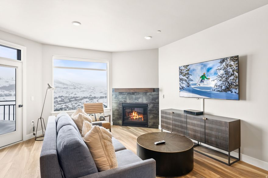 Positioned on the top floor, this residence delivers panoramic vistas of the surrounding mountains and the Jordanelle. Located within Black Rock Mountain Resort, the property is immersed in a full suite of upscale amenities, including an onsite restaurant and bar, a well-equipped fitness center with hot tubs, an arcade, a year-round pool, steam room and sauna, an owner lounge, and complimentary shuttle service to nearby ski resorts and local recreational activities.  Interior features include Bertazzoni appliances, commercial-grade stainless steel finishes, Euro-style glass showers, under-mount sinks, and double-pane windows. The resort's future expansion plans-ice rink, ballroom, enlarged fitness center, and expanded convention facilities-enhance long-term value.  Just 12 minutes to Park City's Main Street and 35 minutes from Salt Lake City International Airport, this turnkey residence is offered fully furnished. Nightly rentals are permitted, providing a compelling opportunity for supplemental income.