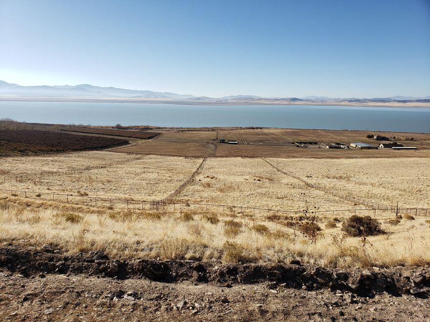 Serene Waterfront Agricultural Land  Perfect for Investment or Country Living   Escape to the peace and beauty of the countryside with this exceptional rural raw land parcel, featuring breathtaking waterfront views and convenient easement access. Whether you're looking to build your dream homestead, start a small farm, or hold a solid long-term investment, this property offers endless possibilities.  Enjoy the natural beauty that surrounds you-open skies, fresh air, and tranquil waters right at your doorstep. With agricultural zoning, you'll have the flexibility to cultivate crops, raise livestock, or simply enjoy wide-open space in a serene, private setting.  Property Highlights: Beautiful waterfront views  ideal for relaxing, fishing, or future recreation.  Easement access for easy entry to your land. Zoned Agricultural  perfect for farming, ranching, or a sustainable lifestyle.  Great investment opportunity  own a tangible asset that grows in value.  Peaceful rural setting  privacy, space, and natural beauty all in one.  220V line is on the farm but not to this parcel. Part of this land was previously orchard with water pumped from lake.