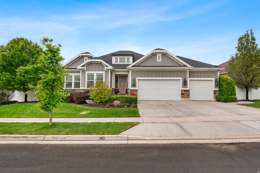 Modern Elegance in the Ivory Ridge Community! This meticulously maintained 3,980 sq. ft. executive rambler features an expansive main level with a gourmet kitchen, a grand great room with vaulted ceilings, fireplace and a luxurious primary suite complete with a separate tub/shower and walk-in closet. The 100% finished basement effectively doubles the living space  providing a cozy atmosphere and is a dream for entertainment and storage.    Situated on a flat 0.23- acre lot in the prestigious Alpine School District, this home is zoned for Skyridge High School. Residents enjoy world-class community amenities including a swimming pool, clubhouse, gym, tennis courts and pickleball for a low monthly HOA. With a fully landscaped yard featuring a basketball court and a fire pit  this home offers a premier turn-key lifestyle in one of Lehi's most desirable neighborhoods.   Square footage figures are provided as courtesy estimates only and were obtained from county records. Buyer is advised to obtain an independent measurement.