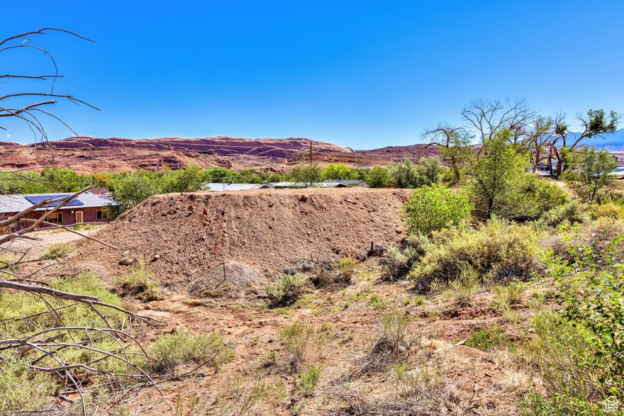 Located just south of Moab's Downtown, this parcel presents an ideal opportunity for small-scale development. Zoned as highway commercial, it offers potential for a mixed-use development combining residential and commercial spaces, with convenient access from both Highway 191 and Holyoak Lane. Seller financing available.
