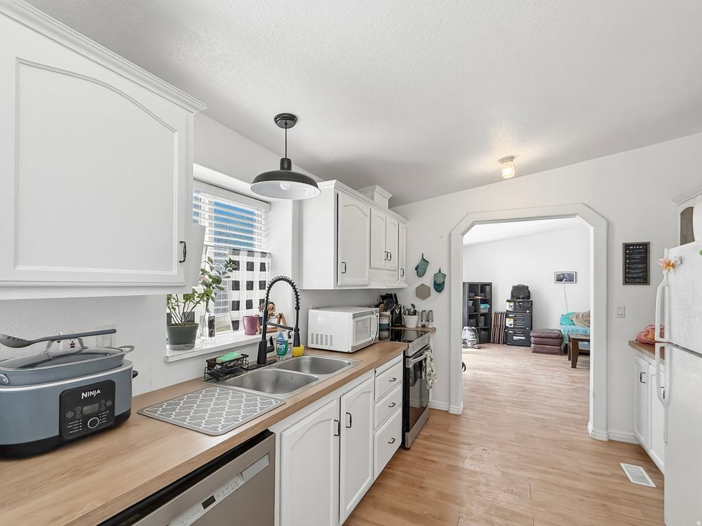 Photo of 12 E 300 S, Tremonton, UT 84337 (MLS # 2156109)