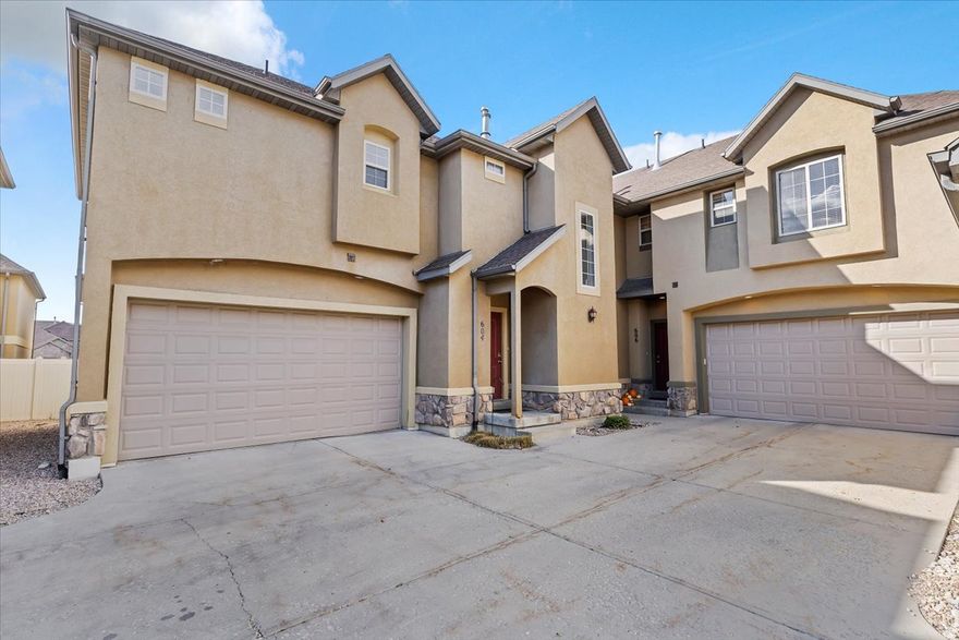 Open House Saturday, March 14th from 12:00 pm - 2:00 pm! WELCOME HOME: This updated townhome is minutes from shopping, dining, medical, theaters, TRAX station and the mountains (skiing, hiking, etc). This community offers quality living starting with the private gated entrance. The home has a fully fenced small backyard. Inside, all 3 bedrooms are upstairs, with a spacious primary suite, oversized bathroom and huge walk-in closet. Nice! Laundry is upstairs where all the laundry is found. There is a small office/den or little living room upstairs, open to the hallway and stairs. Main floor kitchen with thick granite counters, upgraded cabinets and a gas fireplace. Parking offers 2 garage (attached) spaces with extra parking on the street & designated visitor spots. This particular unit has view of the stunning wasatch mountains that are minutes away. Unfinished basement has space for large studio/living room/bedroom and is plumbed for a full bathroom. Call agent with questions. Let's get you in to see it.