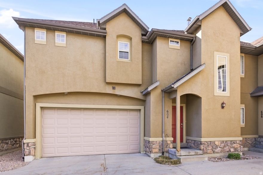 Open House Saturday, March 28th from 10:30 to 12pm! This updated townhome is minutes from shopping, dining, medical, theaters, TRAX station and the mountains (skiing, hiking, etc).  This particular unit has view of the stunning wasatch mountains that are minutes away. This community offers quality living starting with the private gated entrance. The home has a fully fenced small backyard. Inside, all 3 bedrooms are upstairs, with a spacious primary suite, oversized bathroom and huge walk-in closet. Nice! Laundry is upstairs where all the laundry is found. There is a small office/den or little living room upstairs, open to the hallway and stairs. Main floor kitchen with thick granite counters, upgraded cabinets and a gas fireplace.Unfinished basement has space for large studio/living room/bedroom and is plumbed for a full bathroom. Parking offers 2 garage (attached) spaces with extra parking on the street & designated visitor spots. Call agent with questions. Let's get you in to see it.