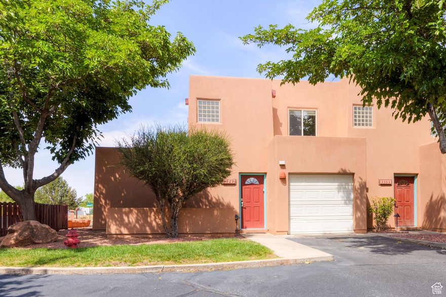Coveted corner unit located in Solano Vallejo- steps from the Moab Golf Course and Steelbender Trailhead! This two-story 3-bedroom, 2-bath townhome is approved for nightly rentals and offered fully furnished, with an established rental history. The main level features a straightforward layout with one bedroom, a gas fireplace in the living area, an open kitchen, and direct access to a small private patio with views of the surrounding red rocks. Upstairs includes two bedrooms, with enough space to accommodate families or small groups. Additional features include an attached one-car garage, in-unit laundry, and central air and heat. Guests or owners can also enjoy access to the community's seasonal pool (typically open April through October). Conveniently located close to local trails, downtown Moab, and national parks, this unit is ready for use as a rental, vacation spot, or lock-and-leave getaway. Square footage figures are provided as a courtesy estimate only and were obtained from county records. Buyer is advised to obtain an independent measurement.