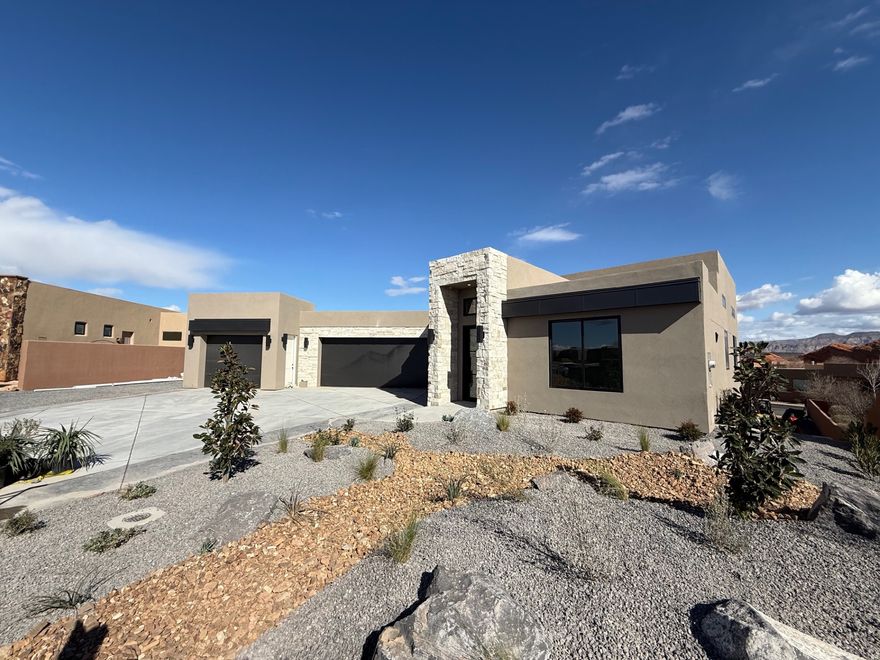 Modern 4-bed, 4-bath home with a walkout basement, located near Sand Hollow Resort. Enjoy sleek design, open living spaces, and stunning views in a prime location-perfect for relaxing or entertaining in Southern Utah's adventure hub.