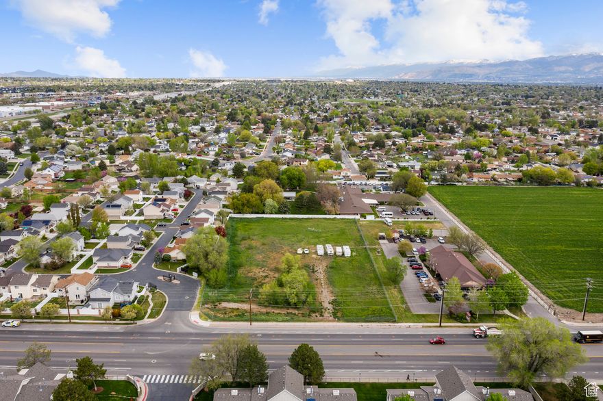 Prime opportunity awaits! This expansive 2-acre commercial lot in West Jordan, Utah offers endless potential for development. Strategically located with high visibility and easy access, it's an ideal spot for businesses looking to thrive. Don't miss out on this rare chance to shape the future of this growing area!