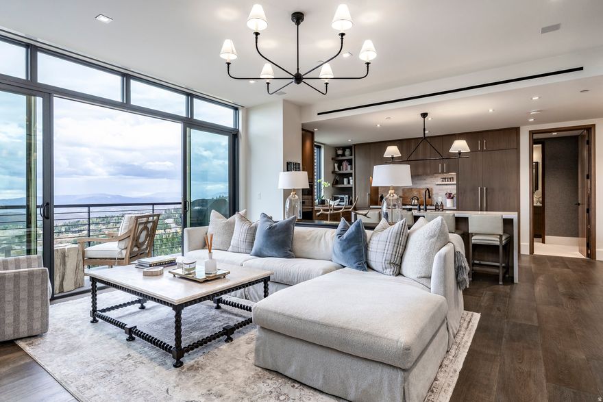 One of only 28 luxury ski-in ski-out residences at Argent in Empire Pass, 7677 Village Way #503 combines elevated design, modern convenience, and unbeatable ski access at Deer Valley Resort. Located just steps from the Silver Strike Express Lift, this 2- bedroom, 3-bathroom, with a den converted to a third bedroom, is offered as a fully furnished turnkey home that features a spacious 1,792 square foot layout with an open floor plan and a forever down-valley view perspective. Built in 2022, high-end custom interiors include:hardwood flooring, heated bathroom floors, steam shower, Lutron blinds, and elegant mountain finishes throughout. Argent owners enjoy exclusive amenities, including a full-time live-in Lodgekeeper, dedicated Ski Valet, slopeside outdoor heated spa, state-of-the-art fitness center, assigned underground parking spot, ample storage, Empire Pass Shuttle, and a vibrant ski lounge with daily continental breakfast and aprs ski happy hours. Family-friendly spaces include a bowling alley with arcade games and a rooftop library retreat.  As part of the exclusive Talisker Club, ownership includes access to the private ski- in/ski-out Tower Club at Empire Pass, featuring on-mountain valet, ski storage, fitness center, spa, heated pool, dining, and kids' club. Membership also includes the Tuhaye Golf Club, Main Street lounge, and The Outpost adventure center. A full Talisker Membership is available by separate purchase.  Argent is located in the heart of Empire Pass at Deer Valley Resort, now recognized as North America's largest ski resort featuring over 4,300 skiable acres, 10 new lifts in the 2025-26 season. Whether for personal use or luxury rental performance, this home is the ultimate basecamp for four-season adventure in Park City.