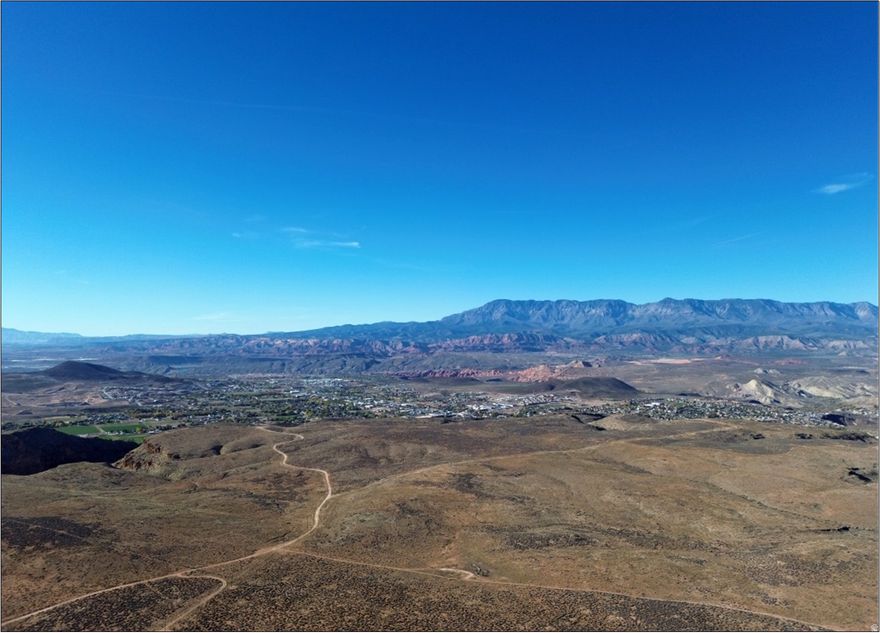 Well-located 357.53 acres on the east bench of Hurricane City, Utah. Beautiful & unique development land overlooking Hurricane City with 360 views of Gould Canyon, Sand Hollow, Signal Peak, Red Cliffs Conservation Area, Gooseberry Mesa, & Zion National Park. Zoned R1-10 (10,000 SF min lot size) in Hurricane City, Utah. Future Hurricane City plans for roads and residential development. Washington County parcels: H-3437-A, H-3437-B, & H-3-2-1-310. Priced below assessed value: $5,720,480, 2024 taxes: $16.39. Located within 20 miles of Sand Hollow Reservoir, St George, Springdale, Interstate 15, SGU Airport, and Zion National Park. Located 115 miles NE of Las Vegas, NV, 250 miles SW of SLC, UT.