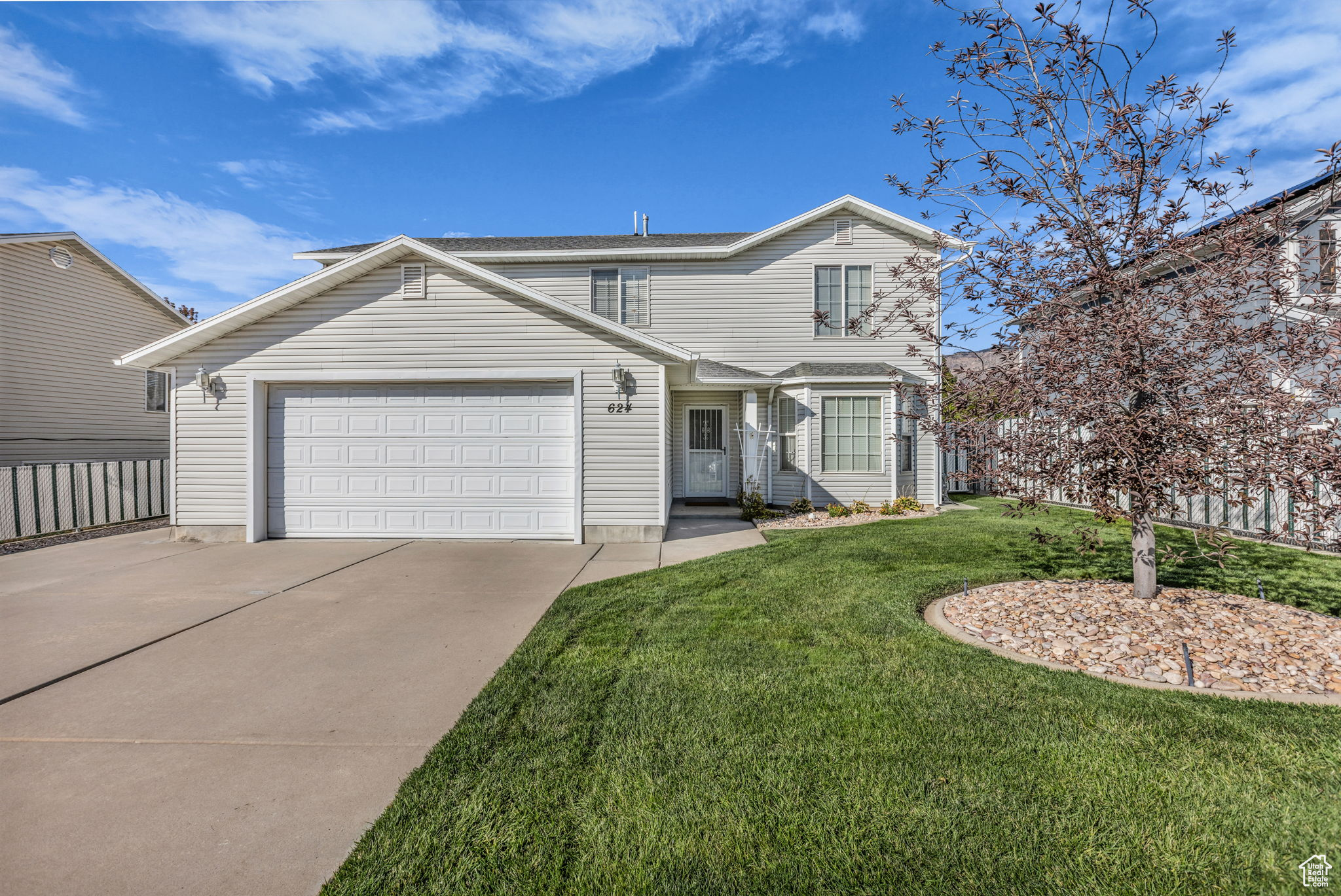 Sprawling 5 Bedroom Home In a Fantasic East Ogden Location. Close To Ogden Canyon, Shopping, Dining, and Schools. Living room off Entry with Bay Archway and Bay Windows, Butlers Pantry to Formal Dining Room. Open Kitchen with Solid Oak Cabinets, and Open to the Family Room with Cozy Gas Fireplace.. Sliding Glass Door to the Extra Large Covered Patio and Fully Fenced & Landscaped Backyard with Darling Storage Shed. Neighborhood Park behind Home. with Easy Access a Few doors down. Main level Laundry & Half Bath. 2nd Level has Primary Bedroom with 2nd Fireplace, Attached En Suite Bathroom, Separate Tub and Shower, Dual Vanity Sink and Walk In Closet. 4 Additional 2nd Level Bedrooms and Full Hall Bathroom. Large 2 Car Garage with Shelving. Square footage figures are provided as a courtesy estimate only. Buyer is advised to obtain an independent measurement.