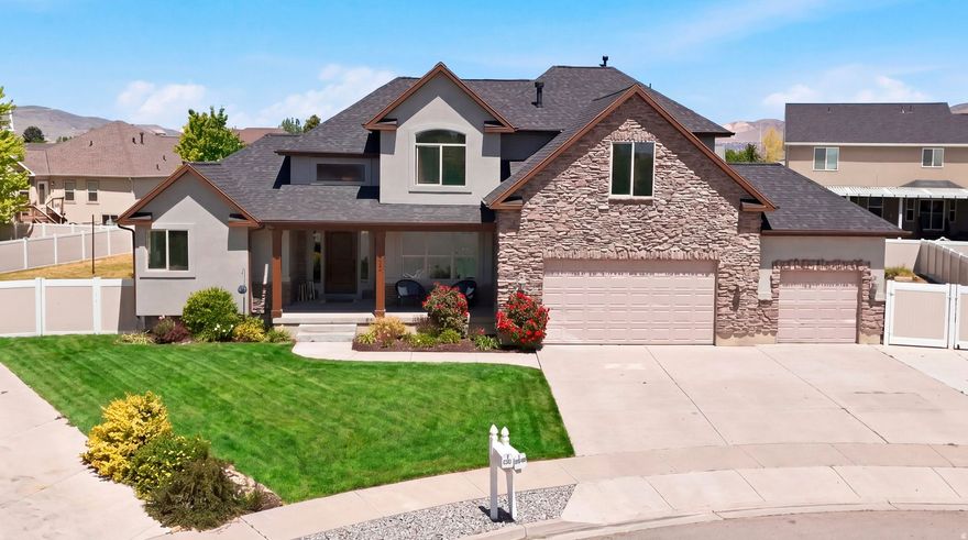 Open House Saturday May 30th, 11am -1pm. Tucked away in a coveted Lehi cul-de-sac, this beautifully refreshed home offers the perfect blend of space, comfort, and lifestyle on a .33 acre fully fenced lot. With multiple gathering spaces, and thoughtful updates throughout, this home is designed for both everyday living and entertaining.  Fresh new paint inside and out, updated flooring and carpet, stunning quartz countertops, new roof & new furnace in basement both installed this year, 2026. You'll love the spacious main floor that features a luxurious primary suite, along with a welcoming family room centered around a cozy fireplace and an additional living room filled with natural light. Upstairs, you'll find four generously sized bedrooms and a full bathroom, creating the perfect setup for family, guests, or flexible work-from-home space. The fully finished basement offers a massive family room ideal for movie nights, game days, or entertaining, along with another finished room that the previous owners used as a bedroom. Downstairs also features a full bathroom, a large storage room, and an additional unfinished bedroom ready to customize to your needs.  Outside, the backyard is a dream with mature landscaping, two separate patio areas for relaxing or hosting, raised garden boxes, an in-ground trampoline, and plenty of room to play, unwind, or gather with friends and family. The fully fenced yard provides both privacy and functionality in one of Lehi's most desirable neighborhoods. Located just minutes from shopping, dining, downtown Lehi and conveniences in both American Fork and Saratoga Springs.