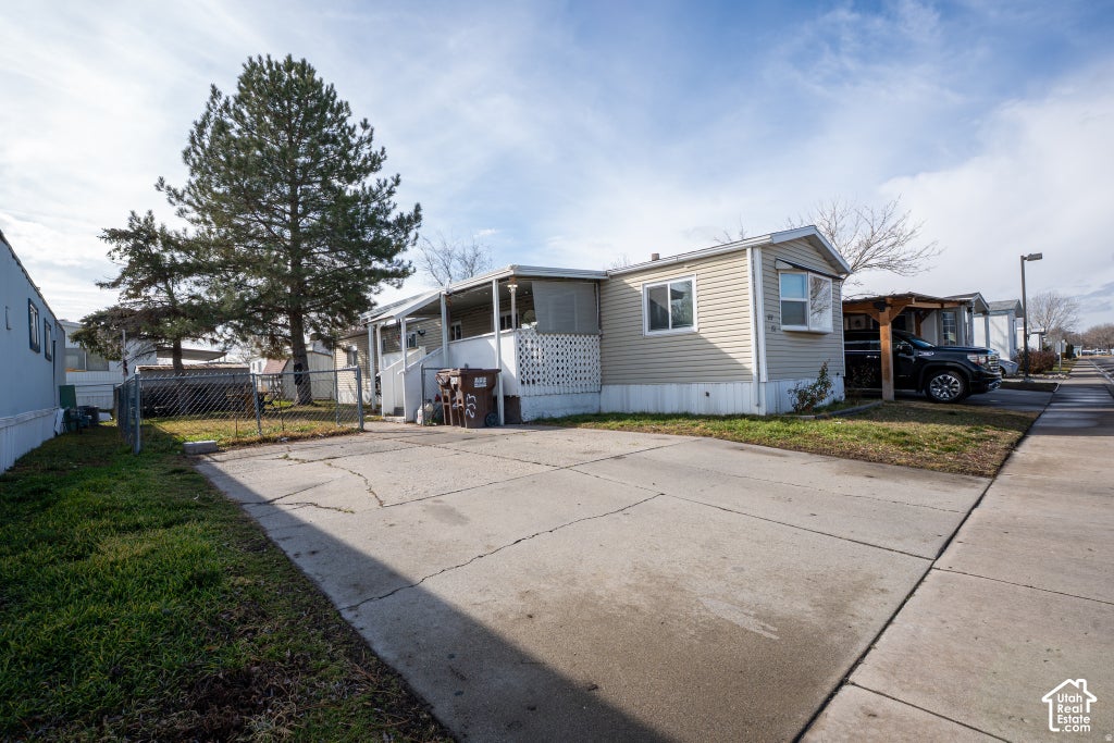 Photo of 3237 W REGENCY PARK S #253, West Valley City, UT 84119 (MLS # 2189879)