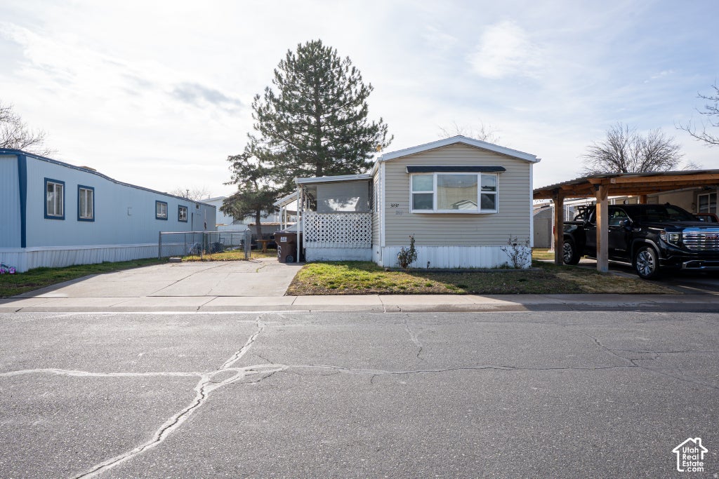 Photo of 3237 W REGENCY PARK S #253, West Valley City, UT 84119 (MLS # 2189879)