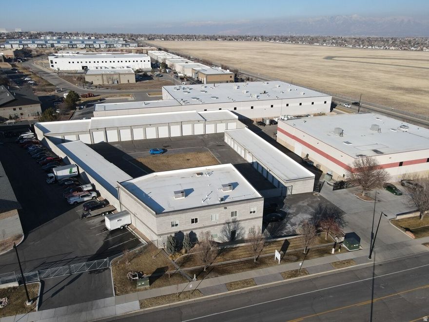 Storage Hybrid/Industrial Investment. Rarely available in the Salt Lake Valley  42 shops, 2 apartments, Flex unit and office space. 100% occupied. Fantastic location in West Jordan near Jordan Landing, Airport 2, and many rooftops.  Gross Income: $302,505 Expenses: $57,590  NOI: $244,915 Members of the ownership entity are licensed real estate agents in the state of utah