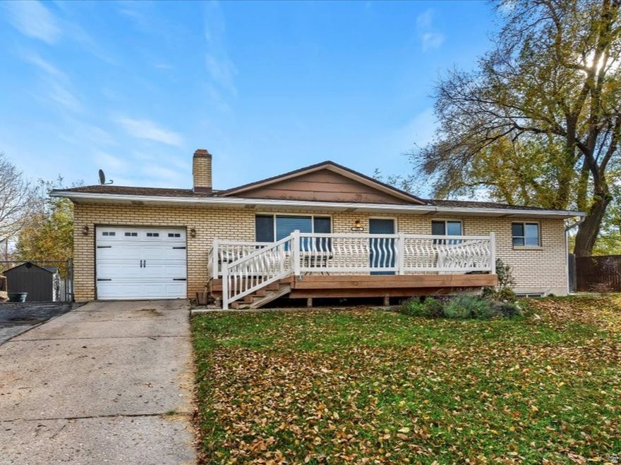 Remarkable midcentury modern rambler just 15 minutes from downtown Salt Lake City. This move-in ready home features original hardwood floors, 2 fireplaces, and beautifully renovated bathrooms. The 4-bedroom layout includes a formal dining room that easily converts to a 5th bedroom. Smart home technology includes Nest thermostat, video doorbell, touchless faucet, smart sprinkler box, and Google Fiber internet. Enjoy excellent storage throughout. Updated HVAC system (2018). The fully fenced backyard offers privacy and includes a hot tub for relaxation. Additional features include a 1-car garage and ample storage space. Classic midcentury character meets modern convenience in this impressive home.