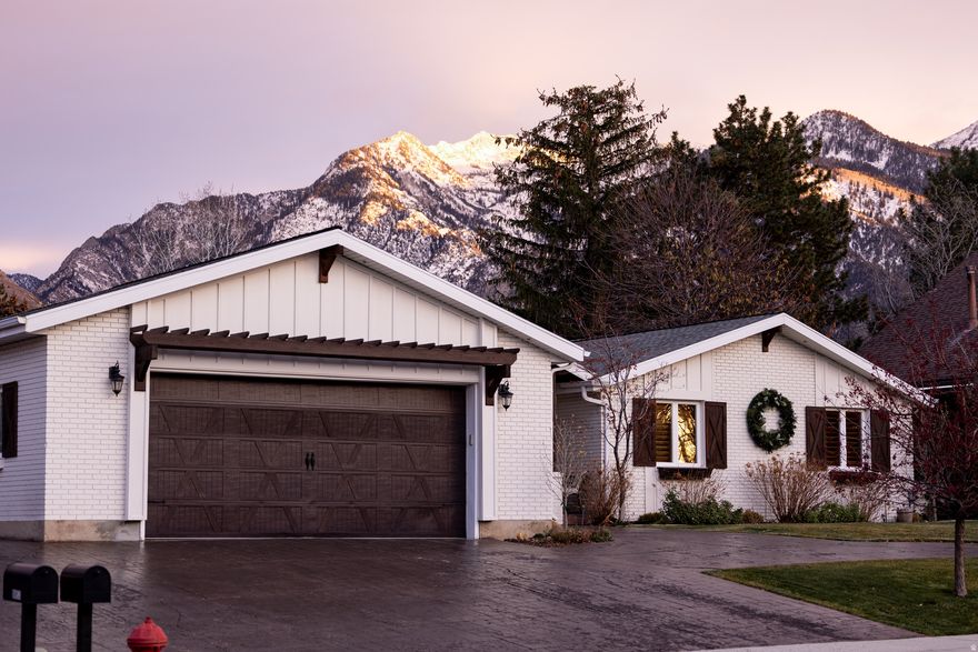 Beautiful, mountain style rambler in desirable East Bench neighborhood. Perfect layout with room to spread out. Huge vaulted ceilings with stunning views of the Wasatch. Immaculate landscaping with lush gardens and shade. Back decks are a summertime oasis. Close to shopping, great schools and the canyons.