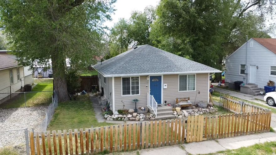 Affordability and Value Come together making this a must see!  Adorable bungalow with a large back yard boasting pride of ownership.   This home is perfect for both home owners and investors.  Roof was installed within the last 5 years, new paint, fenced front and back, clean and open.  Community is the best way to describe the vibe of this gem.   If you are looking for Affordability, Value and Community, this is home for you!