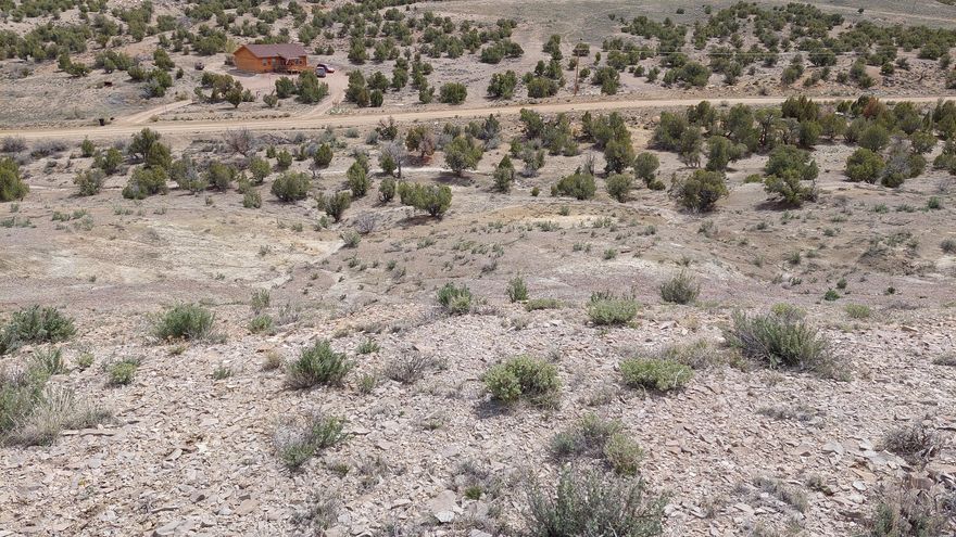 Building lot in the Utah Mini Ranches. 2.51 acre lot just outside of town. HOA will tie in the water when your ready to build. Every lot was previously tested and approved for septic systems. This lot is ready to go! Adjacent lot available. Seller is willing to sell both lots together totaling 5 acres. Send us an offer! Buyer to verify all info.