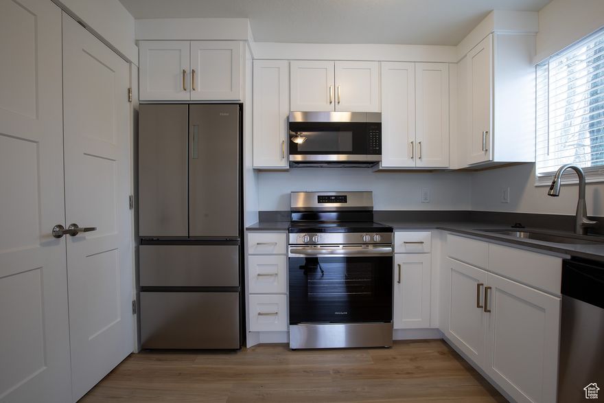 Completely renovated 2 bed/2 bath, top floor condo in Wedgewood Willow.  Spacious rooms with an abundance of natural light.  Beautiful Mount Olympus view from the top floor covered balcony.  New custom kitchen with quartz countertops, all new appliances and fixtures.  New flooring throughout, all new windows and sliding glass door.  New bathrooms with custom vanities and quartz counters.  New interior doors and front door, new water heater, newer furnace and AC unit.  Laundry hookups in unit.  Close proximity to restaurants/movie theater/entertainment/freeway access.  Two parking spaces (one covered).  Beautiful grounds with green space and tennis court.  High quality remodel, must see! Seller financing available, with substantial down payment.  Call agent to discuss terms.