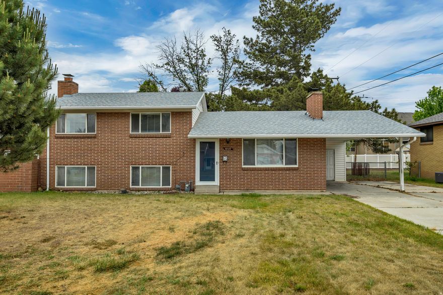 Prime location! Enjoy lots of natural light in this 3 bed/2 bath home featuring an open floor plan. Updated kitchen has stainless steel appliances, quartz countertops, and lots of cabinets. This home has hardwood floors, a large family room, two fireplaces, an enclosed back yard, carport, and a large laundry/storage area with washer & dryer included. Basement has separate entrance so could be used as a separate living area - no kitchen.  Newer furnace and A/C and a new liner in sewer main line. Close to shopping, schools, & freeway. Come check it out today!