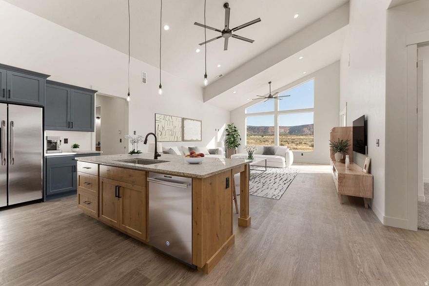 Discover the perfect blend of space, comfort, and location in this 4-bedroom, 3-bathroom home with a 1-bed, 1 bath detached casita on 2.34 acres in scenic Kanab, Utah. Short-term rental approval offers incredible income potential, while the property's design is ideal for hosting family, friends, or guests from around the world. Inside, you'll love the vaulted ceilings in the kitchen and living room, filling the home with natural light and mountain views. The detached casita provides a private retreat for guests or a flexible space for your needs. Step outside and you're just minutes from world-class adventure: Lake Powell  75 miles, Zion National Park  30 miles, Grand Canyon North Rim  80 miles, Bryce Canyon  80 miles. Whether you're looking for an adventure hub, a peaceful retreat, or a smart investment property, this home delivers. Plenty of room for toys, boats, RVs, pickleball courts and outdoor living - all in a location that's a gateway to the Southwest's most iconic landscapes. Live it. Rent it. Adventure from it.