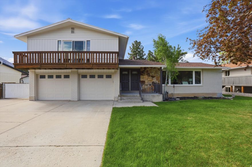 Turn-key, stylish, and packed with space, this beautifully remodeled, 2 car garage, tri-level in Orem checks every box! Featuring 5 spacious bedrooms and 3 full bathrooms, this home offers the perfect blend of comfort and functionality. The private primary suite is a true retreat, complete with its own deck, dual sinks, a full en suite bath, and a generous walk-in closet. The inviting family room showcases a cozy fireplace and built-in bookshelves, perfect for relaxing evenings while the open, updated living spaces are ideal for both everyday living and entertaining. Enjoy Utah's stunning scenery with breathtaking mountain views from multiple outdoor spaces, including a covered front porch, back deck, and additional patio area. The fully fenced yard provides privacy and room to play, garden, or unwind, plus a convenient shed for extra storage. With central air and thoughtful upgrades throughout. This home is move-in ready!