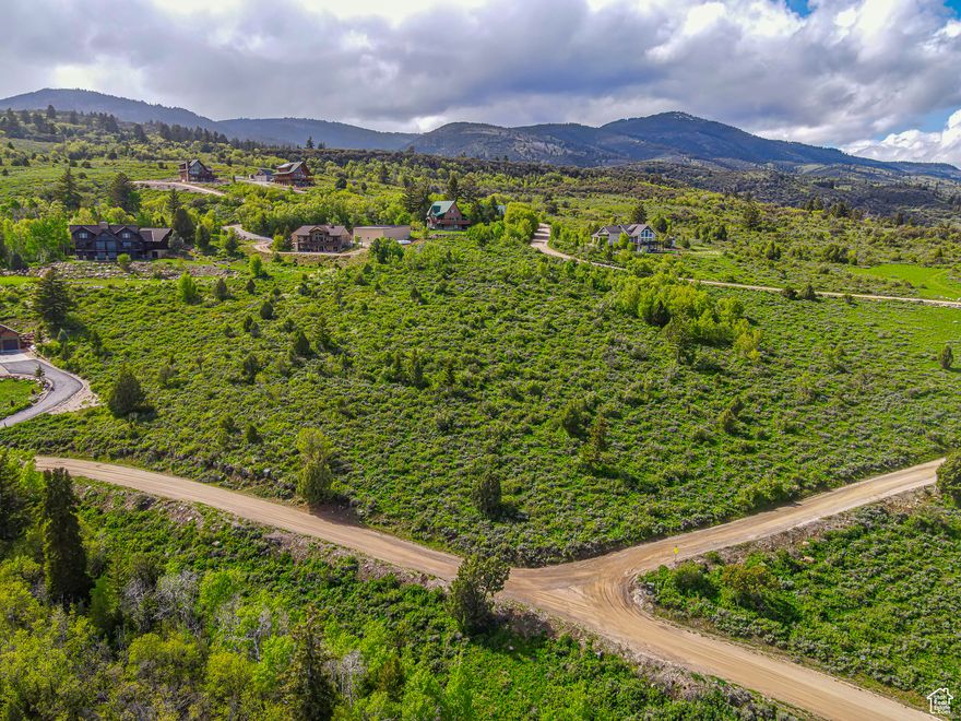 Embrace the beauty of mountain living on this spacious 1-acre corner lot in the scenic Bridgerland Village Subdivision, perched above Bear Lake. With its prime location near Logan Canyon, Beaver Mountain, and National Forest access, outdoor recreation is right at your doorstep. The lot's gentle slope makes it easy to build and showcases stunning views of both the lake and surrounding mountains. Enjoy added privacy and space on a corner lot-ideal for your dream cabin, a quiet getaway, or year-round adventure base. Boundary lines are provided as a courtesy; buyer to verify all information.