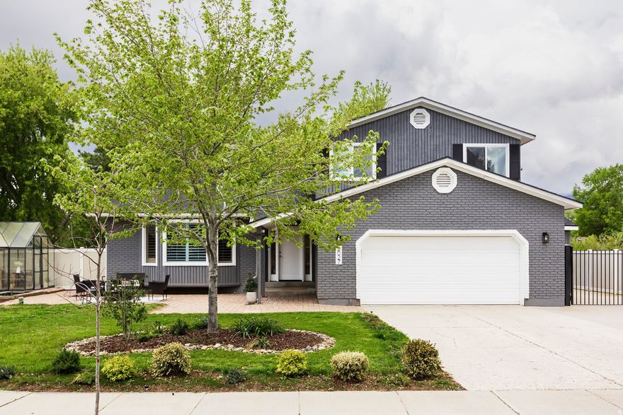 This newly renovated home is nestled in a quiet, well-established neighborhood on Sandy's desirable east side. Thoughtfully updated, the main floor now features an improved layout that enhances both flow and functionality, complemented by newly completed flooring throughout for a fresh, modern feel. The main level offers a formal living and dining area, a beautifully updated kitchen with stainless steel appliances, and a cozy dining space, as well as a welcoming family room with a fireplace. You'll also find a convenient laundry room with an attached half bath. Upstairs, you'll find a spacious primary suite with an updated bathroom, two additional bedrooms and another updated full bathroom. The fully finished basement provides even more living space with three additional bedrooms and a full bathroom. Step outside to enjoy a quiet, secluded backyard featuring a large deck, perfect for entertaining or relaxing. The property also includes a greenhouse, sprinkler system, ample parking, and a brand-new roof installed in 2025, offering added value and peace of mind. With its extensive updates, flexible layout, and inviting indoor-outdoor living spaces, this home is truly move-in ready.